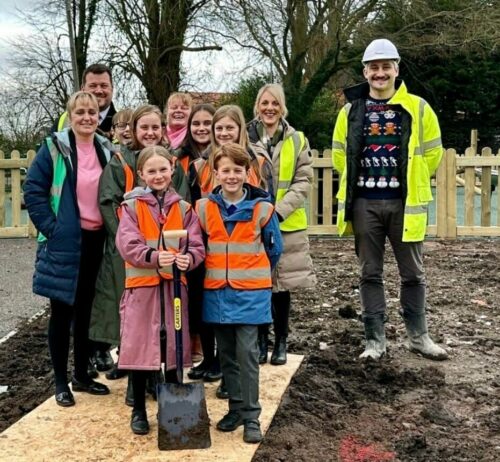 Students bury time capsule at Alderwood Gardens to show future generations what life was like. Thumbnail